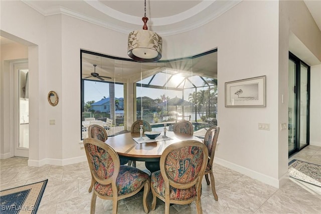 dining area with crown molding