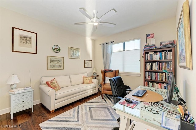 office with dark hardwood / wood-style flooring and ceiling fan