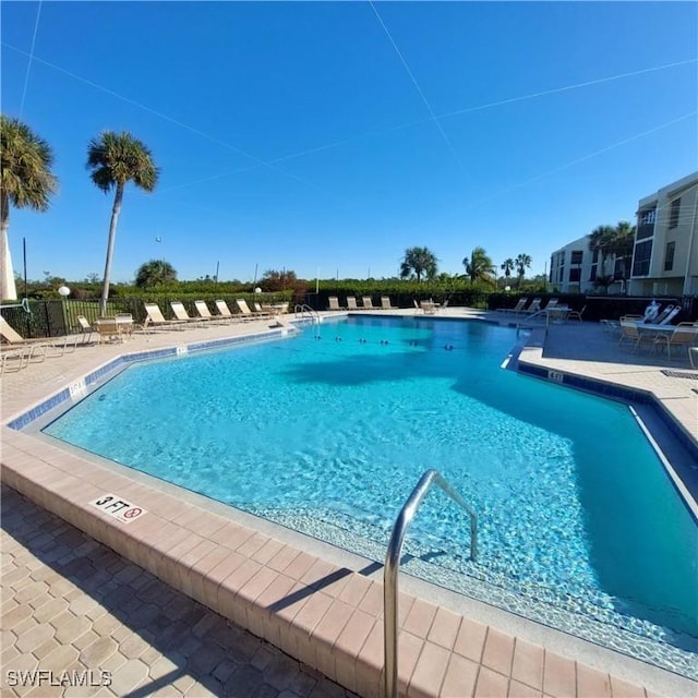 view of pool featuring a patio