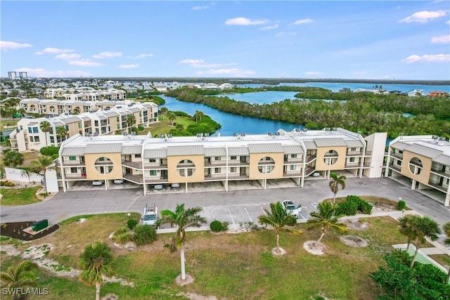 drone / aerial view featuring a water view