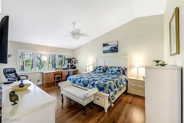 bedroom with ceiling fan, dark wood-type flooring, and lofted ceiling