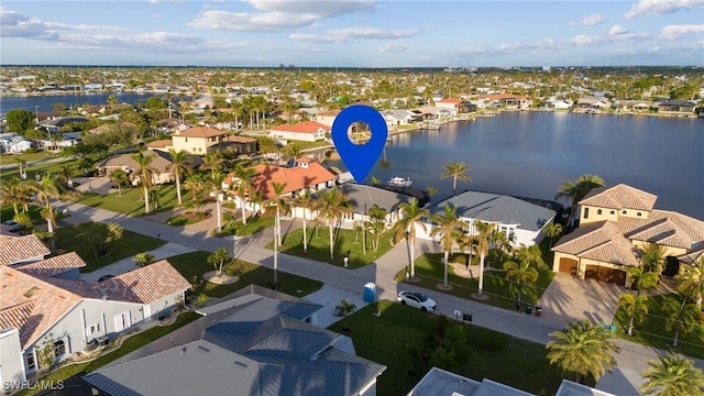 bird's eye view with a water view