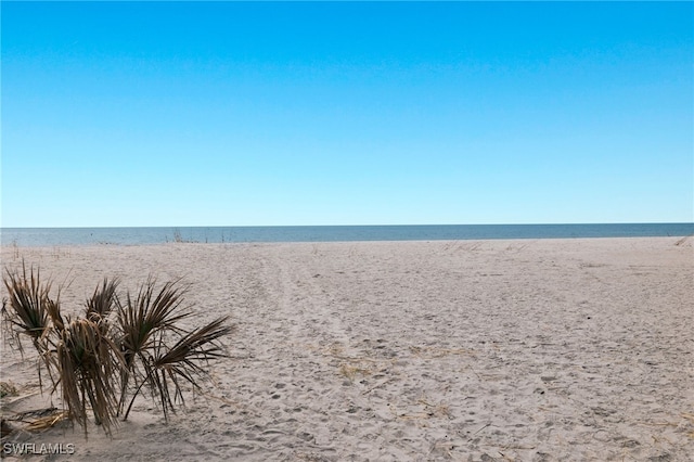 property view of water with a beach view