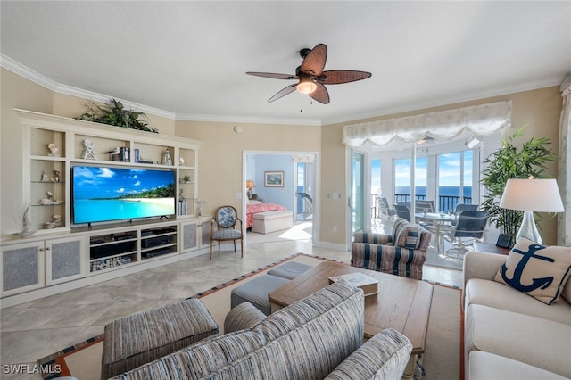 living room featuring a water view, crown molding, and ceiling fan