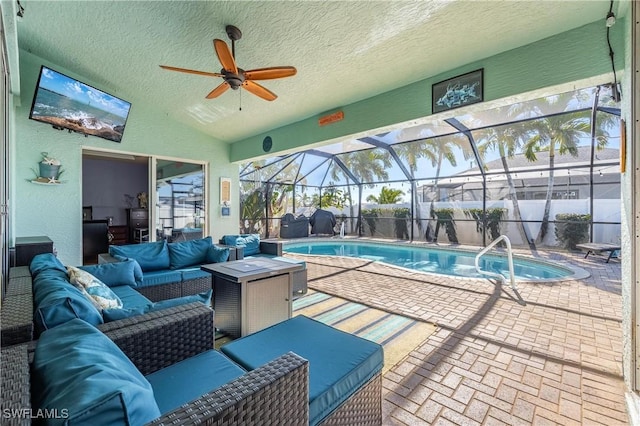 view of swimming pool featuring outdoor lounge area and a patio