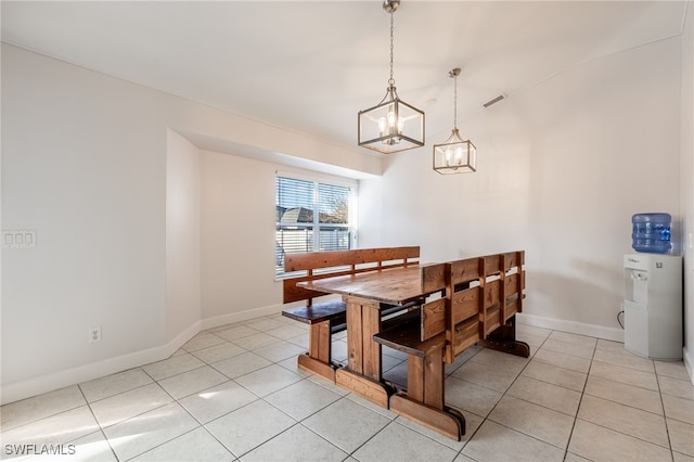 view of tiled dining space