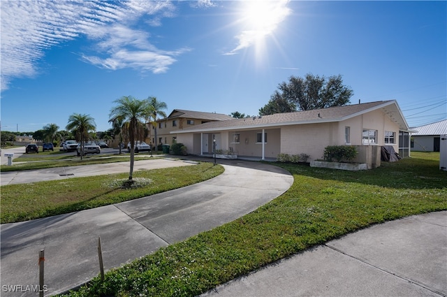 view of front of home with a front yard