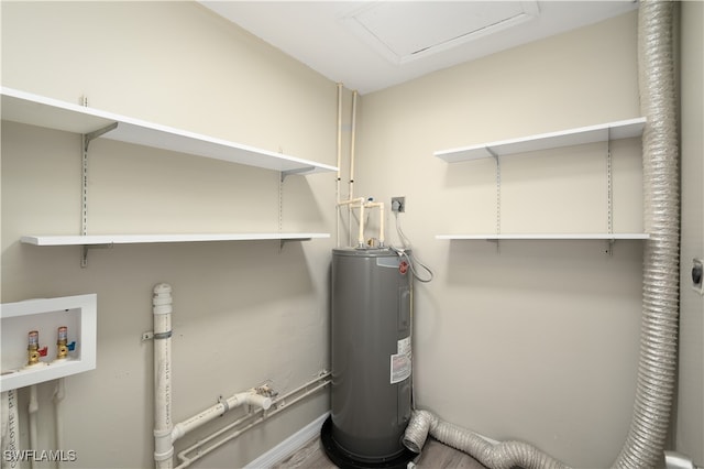 utility room featuring electric water heater