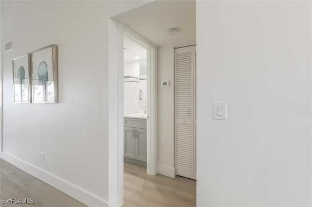 hall featuring light hardwood / wood-style flooring