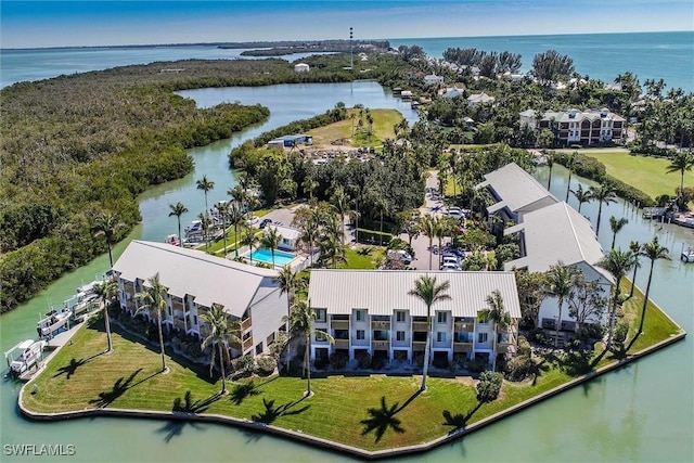 drone / aerial view with a water view