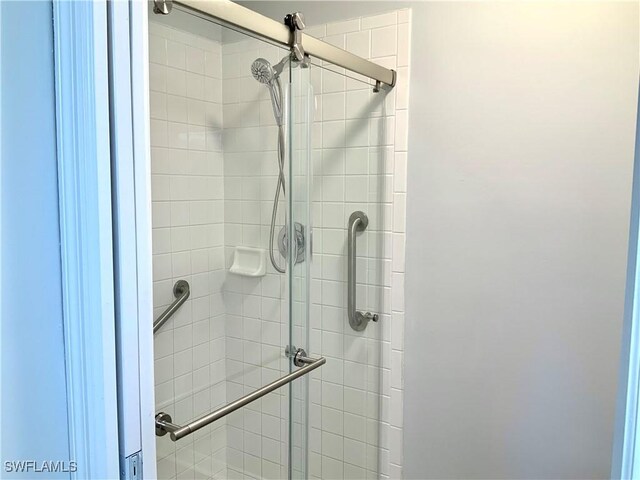 bathroom with an enclosed shower