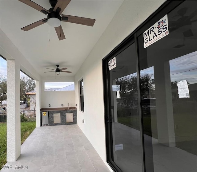 view of patio with exterior kitchen