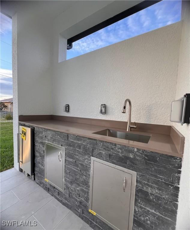 view of patio with sink