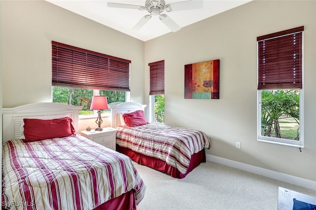 bedroom featuring ceiling fan and carpet floors