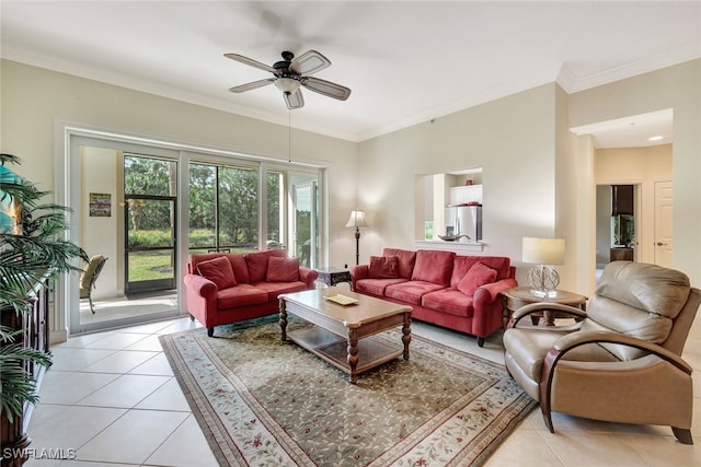 tiled living room with ceiling fan and crown molding