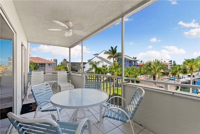 exterior space featuring ceiling fan