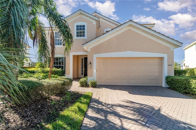 view of front of home with a garage