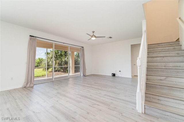 unfurnished room with light hardwood / wood-style floors and ceiling fan