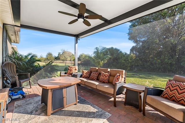 view of patio featuring an outdoor hangout area and ceiling fan