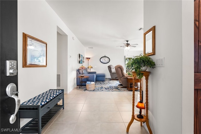 hallway featuring light tile patterned floors