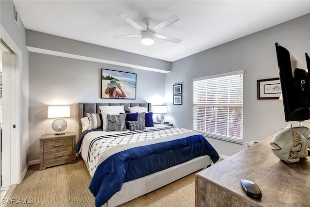 bedroom with visible vents, ceiling fan, and baseboards