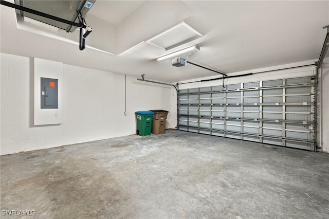 garage with electric panel and a garage door opener