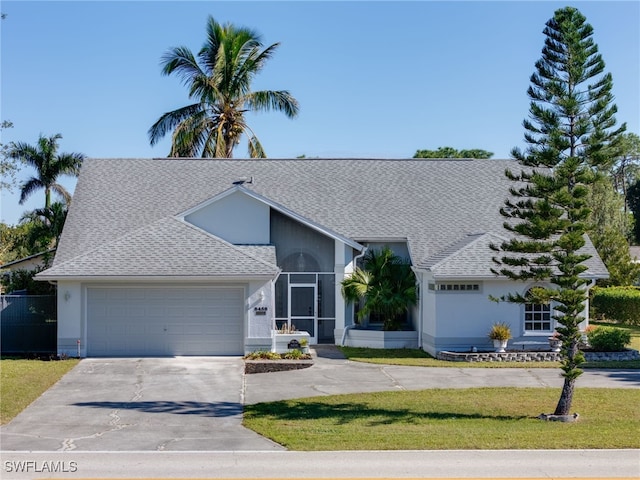 single story home featuring a garage