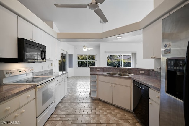 kitchen featuring white cabinetry, sink, ceiling fan, light tile patterned floors, and black appliances