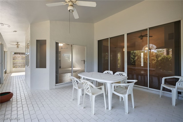 view of patio / terrace featuring ceiling fan