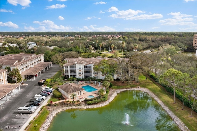 drone / aerial view with a water view