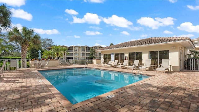 view of pool featuring a patio