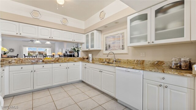 kitchen with white cabinets, ceiling fan, and white dishwasher