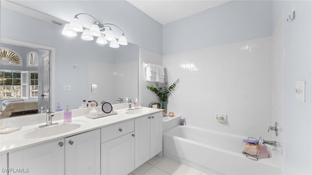 bathroom with tile patterned flooring and vanity