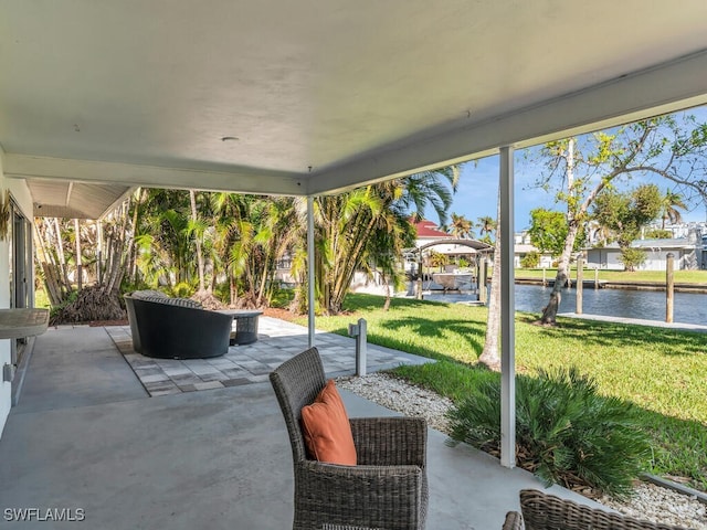 view of patio featuring a water view