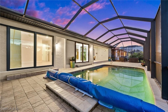 2405 Cherimoya Ln, Saint James City, FL 33956 - view of swimming pool with a covered pool, a patio area, and a lanai