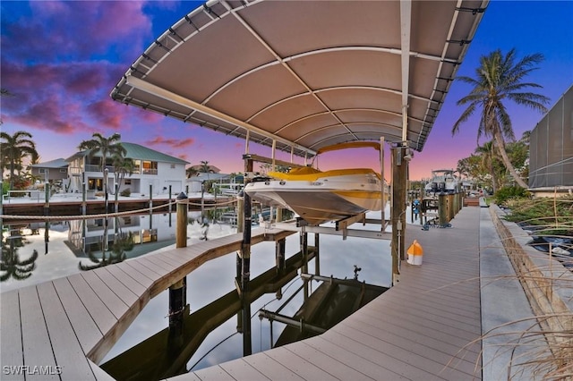 2405 Cherimoya Ln, Saint James City, FL 33956 - dock area featuring boat lift and a water view