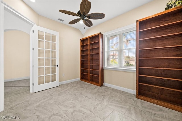 2405 Cherimoya Ln, Saint James City, FL 33956 - unfurnished room with ceiling fan and french doors