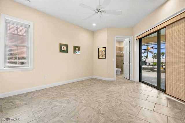 2405 Cherimoya Ln, Saint James City, FL 33956 - unfurnished room featuring a ceiling fan, marble look tiles, and recessed lighting