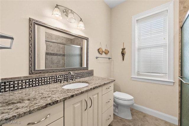 bathroom with walk in shower, tile patterned flooring, toilet, decorative backsplash, and vanity