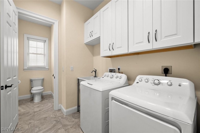 2405 Cherimoya Ln, Saint James City, FL 33956 - washroom featuring washing machine and clothes dryer and cabinet space