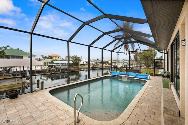 view of swimming pool with a boat dock, a patio, a water view, and glass enclosure