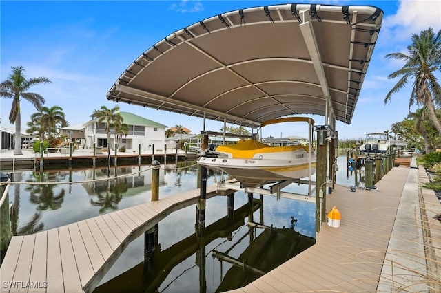 dock area with a water view