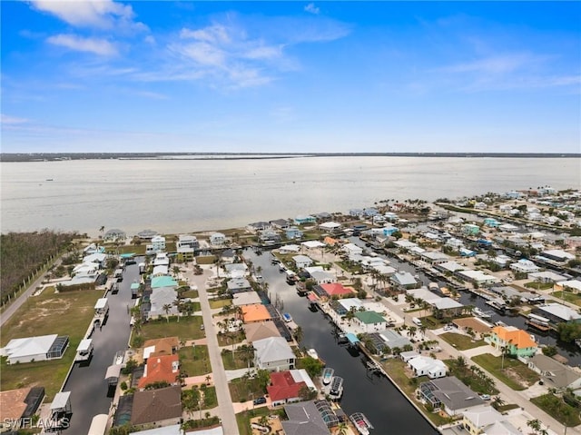 2405 Cherimoya Ln, Saint James City, FL 33956 - aerial view of property's location with a nearby body of water and nearby suburban area