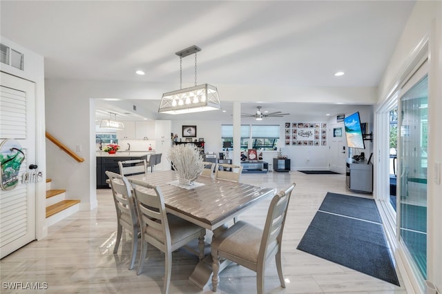 dining area with ceiling fan