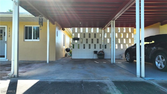 exterior space featuring a carport