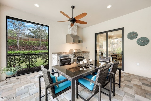 dining room featuring ceiling fan