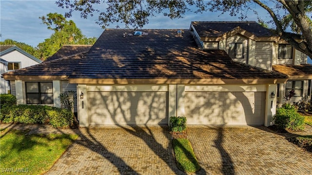 view of front of property featuring a garage