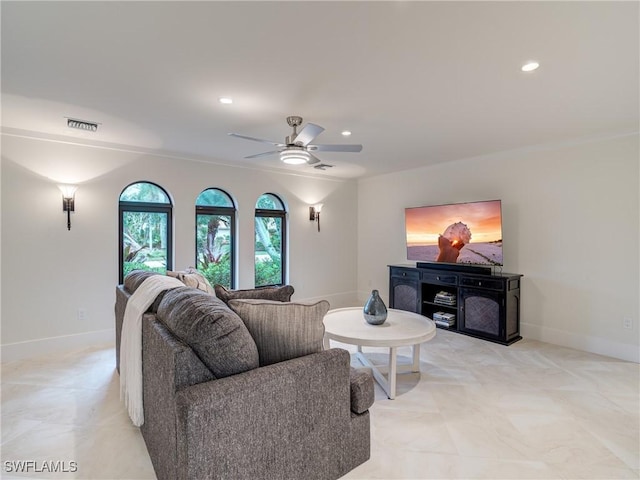 living room with recessed lighting, visible vents, ceiling fan, and baseboards