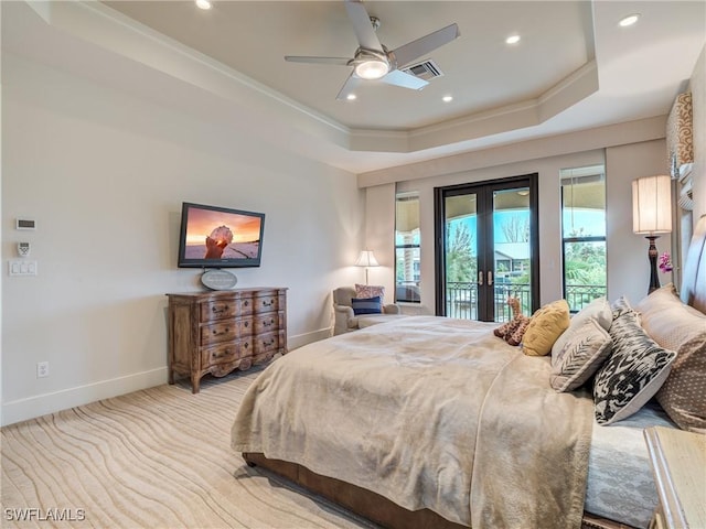 carpeted bedroom featuring french doors, a tray ceiling, access to outside, and baseboards