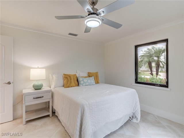 bedroom with a ceiling fan, baseboards, visible vents, and crown molding